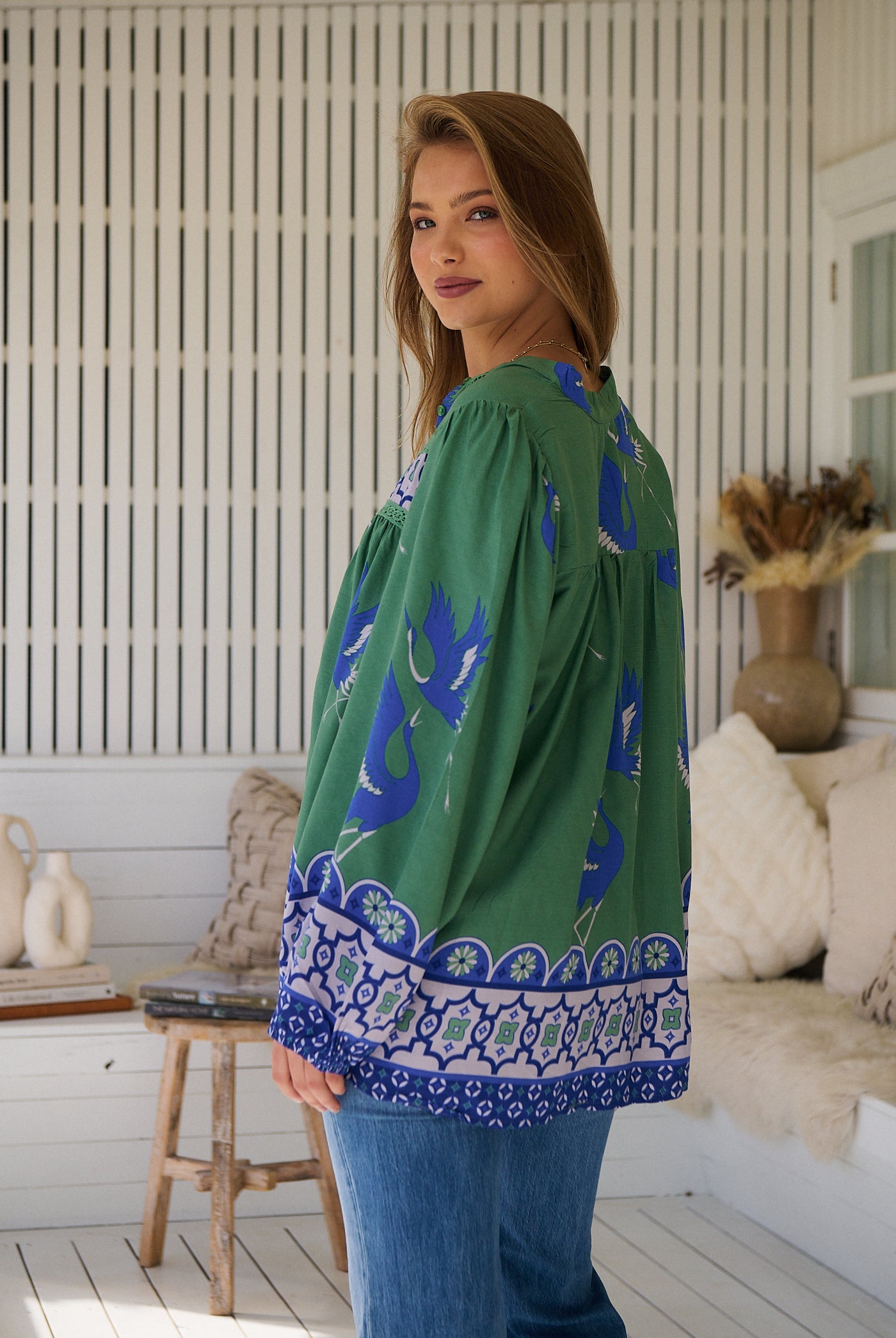Model wears rayon Boho blouse with vintage print - feminine & effortless