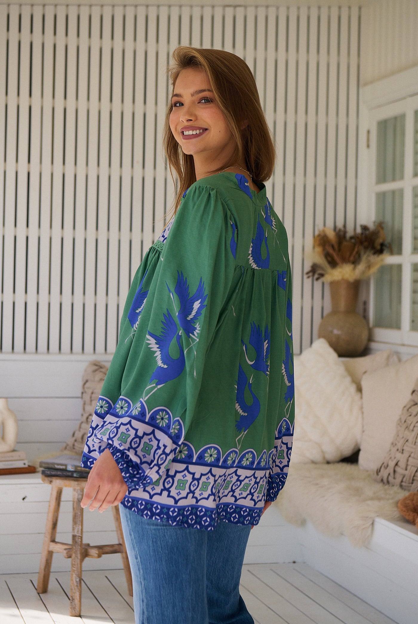 Model wears rayon Boho blouse with vintage print - feminine & effortless