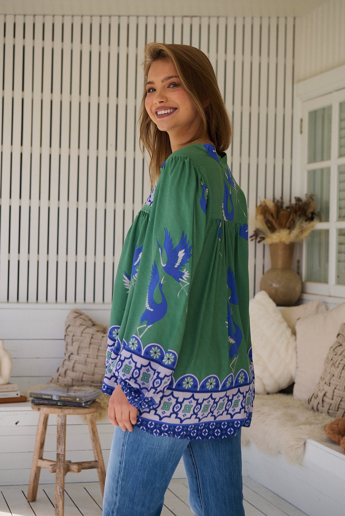 Model wears rayon Boho blouse with vintage print - feminine & effortless