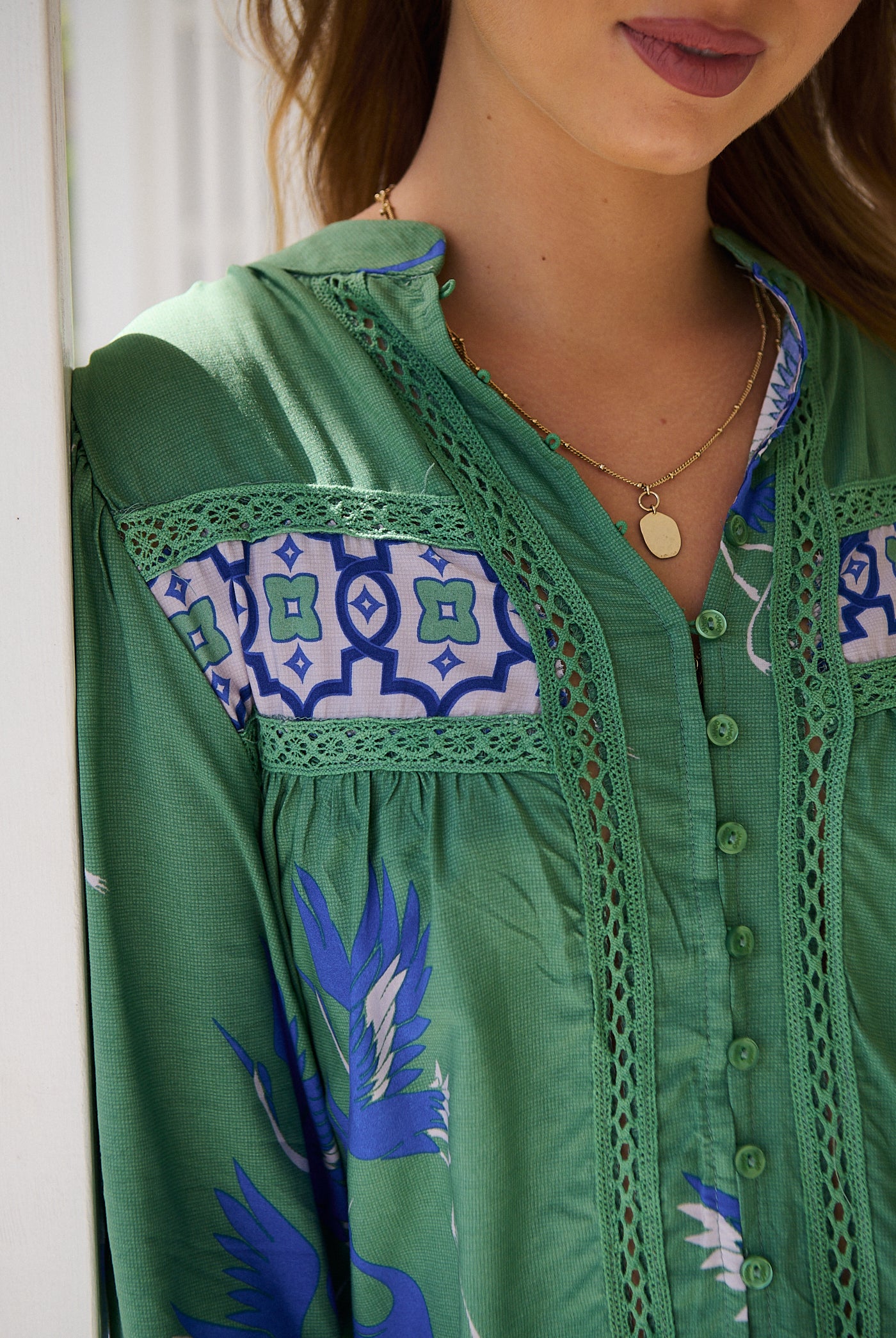 Model wears rayon Boho blouse with vintage print - feminine & effortless