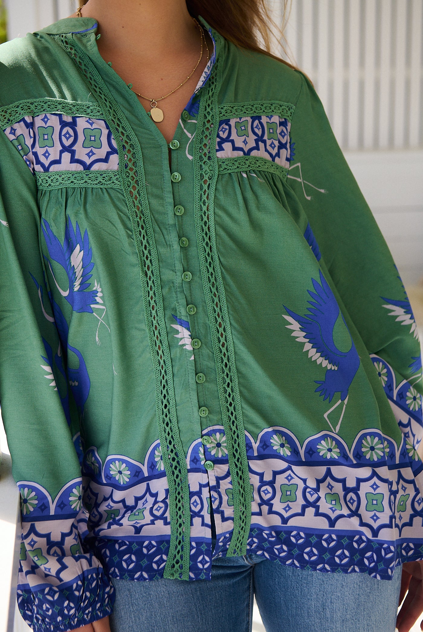 Model wears rayon Boho blouse with vintage print - feminine & effortless