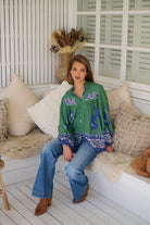 Model wears rayon Boho blouse with vintage print - feminine & effortless