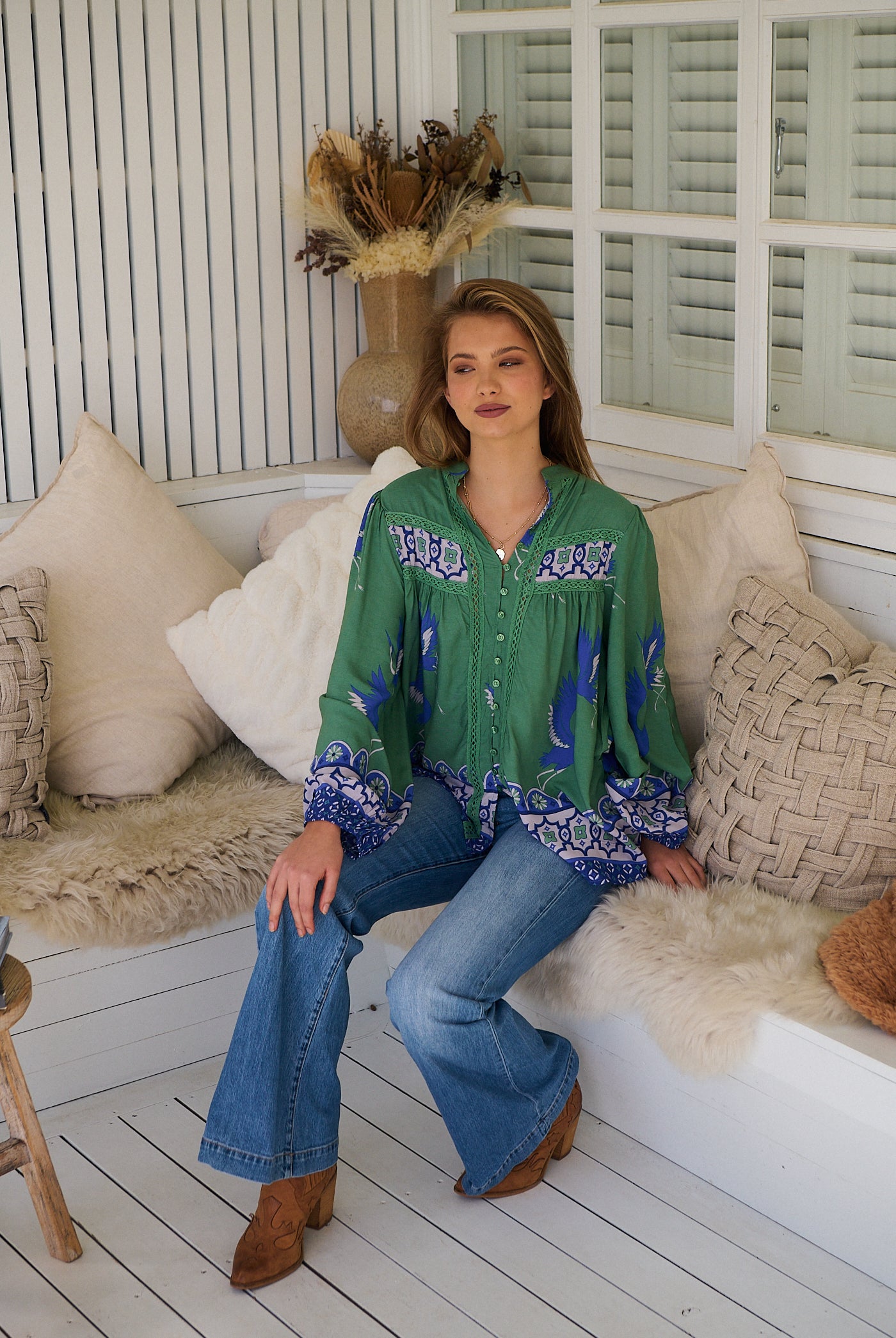 Model wears rayon Boho blouse with vintage print - feminine & effortless