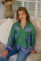 Model wears rayon Boho blouse with vintage print - feminine & effortless