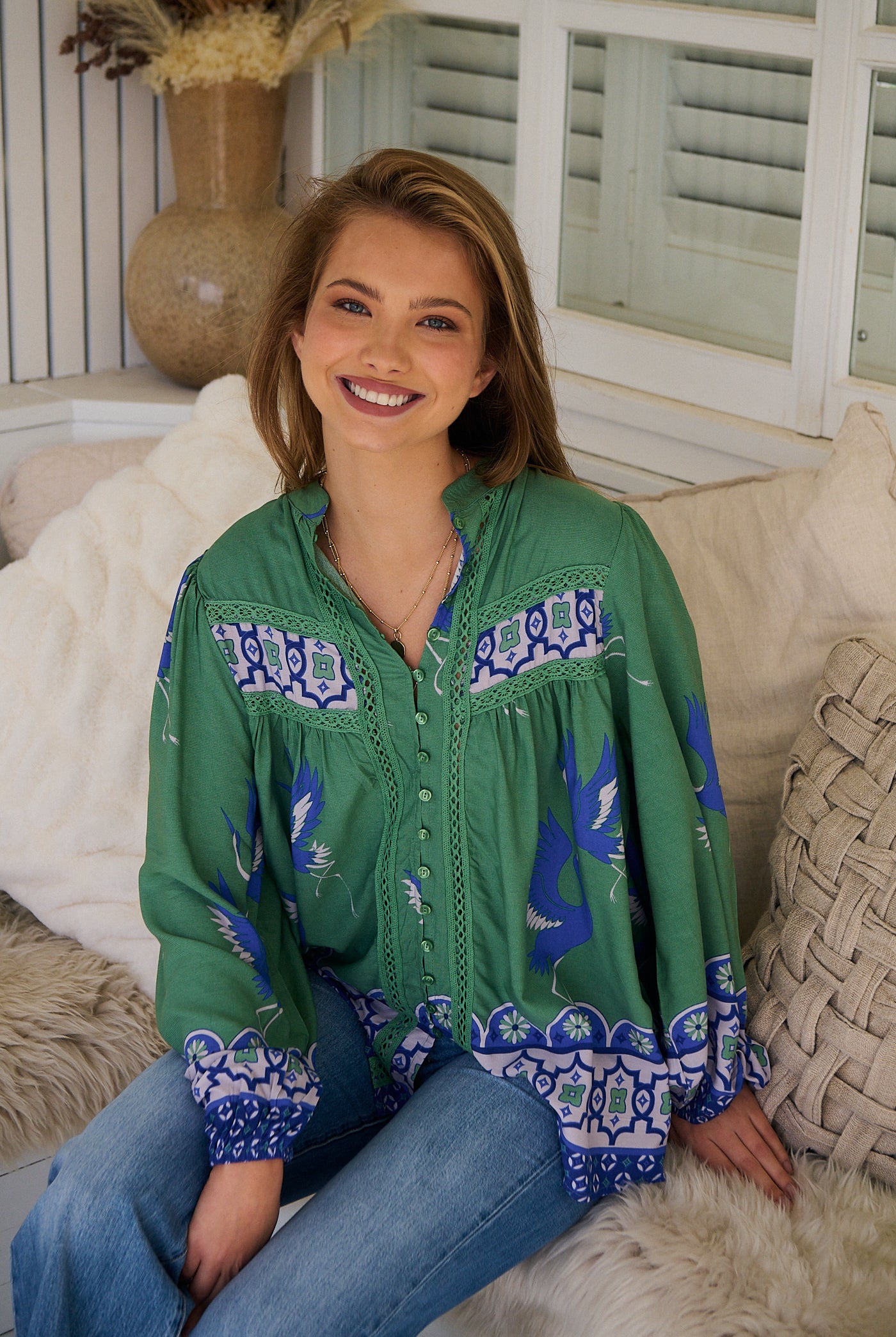 Model wears rayon Boho blouse with vintage print - feminine & effortless