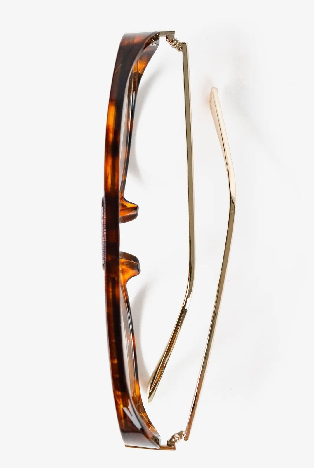 Woman wearing Jacqueline oversized aviator sunglasses in brown tortoiseshell with gradient lenses