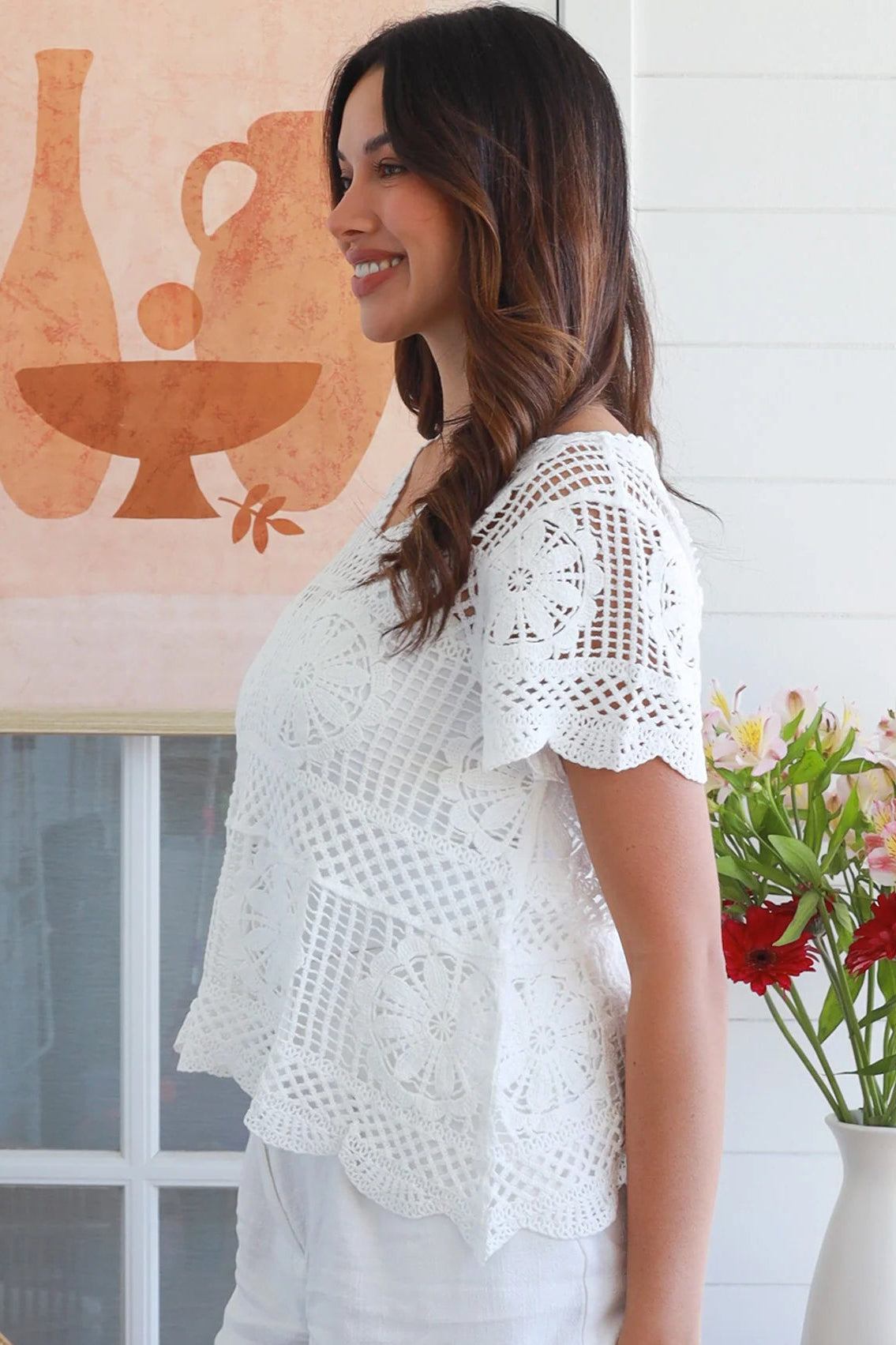 White cotton crochet top with mandala motifs scalloped sleeves and peplum hem – boho summer fashion