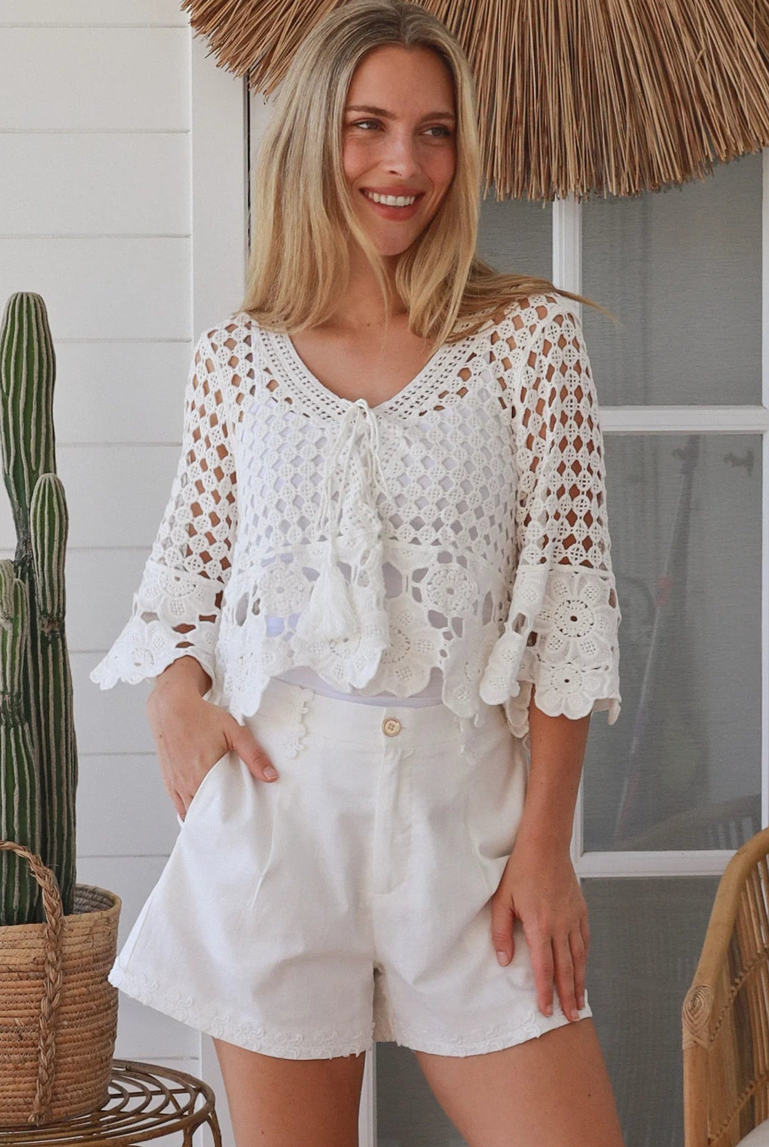 White cotton crochet boho top with tassel ties and three quarter bell sleeves lightweight textured blouse Australia