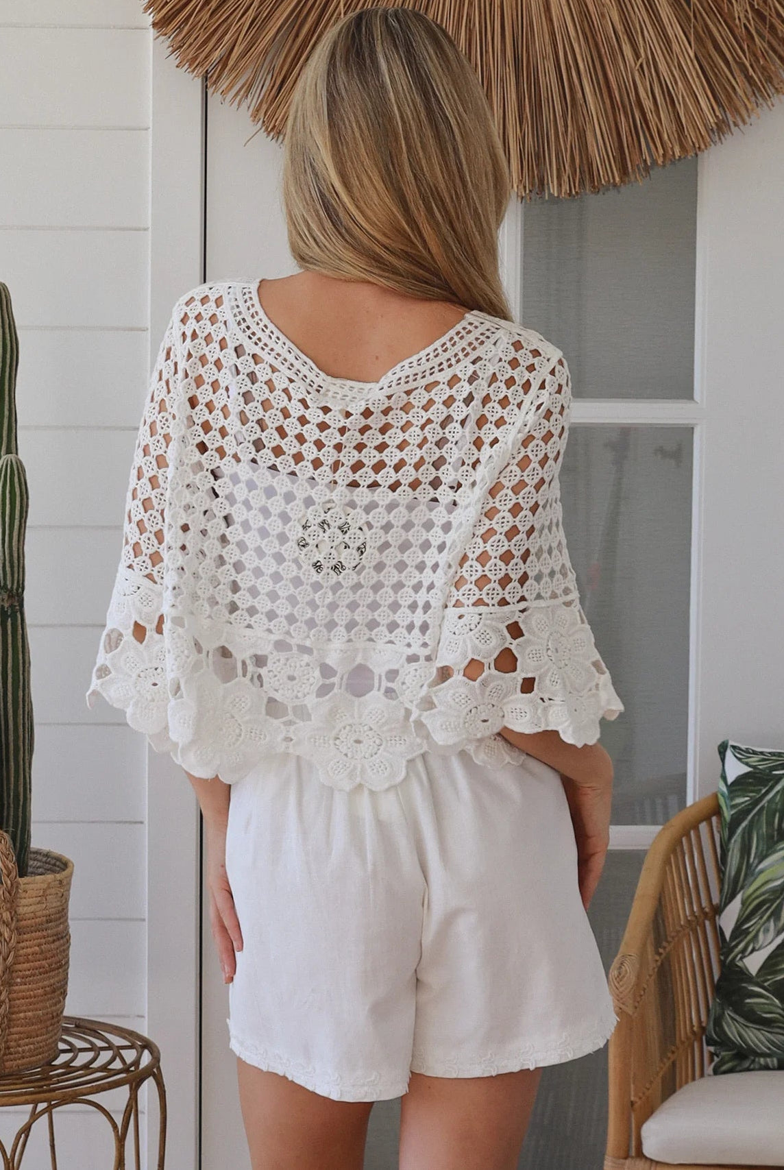 White cotton crochet boho top with tassel ties and three quarter bell sleeves lightweight textured blouse Australia