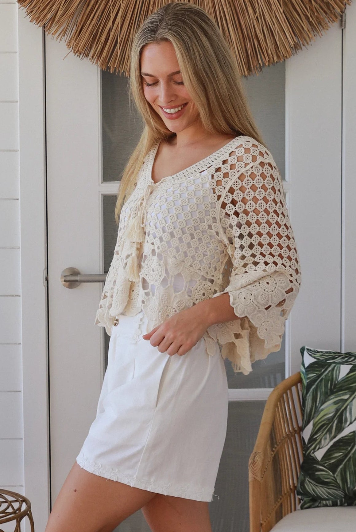 Cream cotton crochet boho top with tassel ties and three quarter bell sleeves lightweight textured blouse Australia