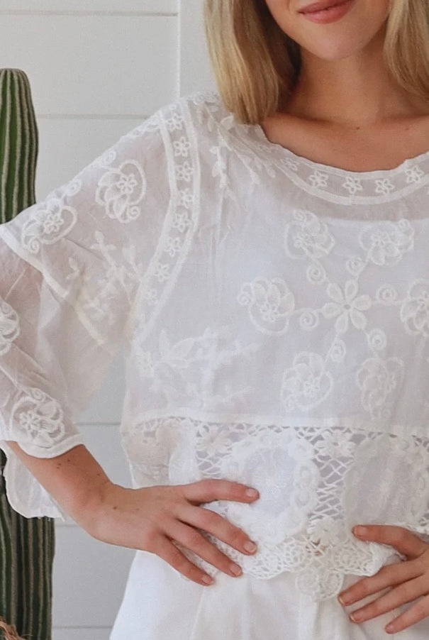 white embroidered cotton and crochet boho top with scalloped sleeves breathable cotton blouse australia