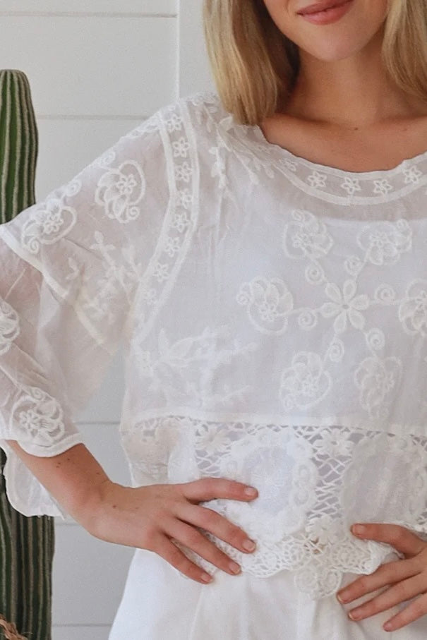 white embroidered cotton and crochet boho top with scalloped sleeves breathable cotton blouse australia