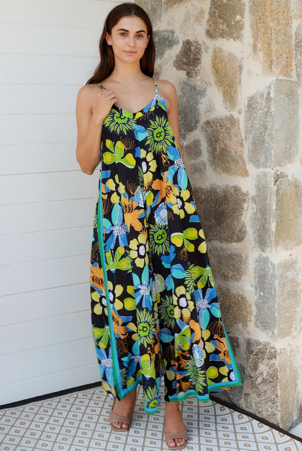 Woman in The Rio Jumpsuit — relaxed wide leg tropical boho jumpsuit with contrast side stripe | Bohemian Love Runway