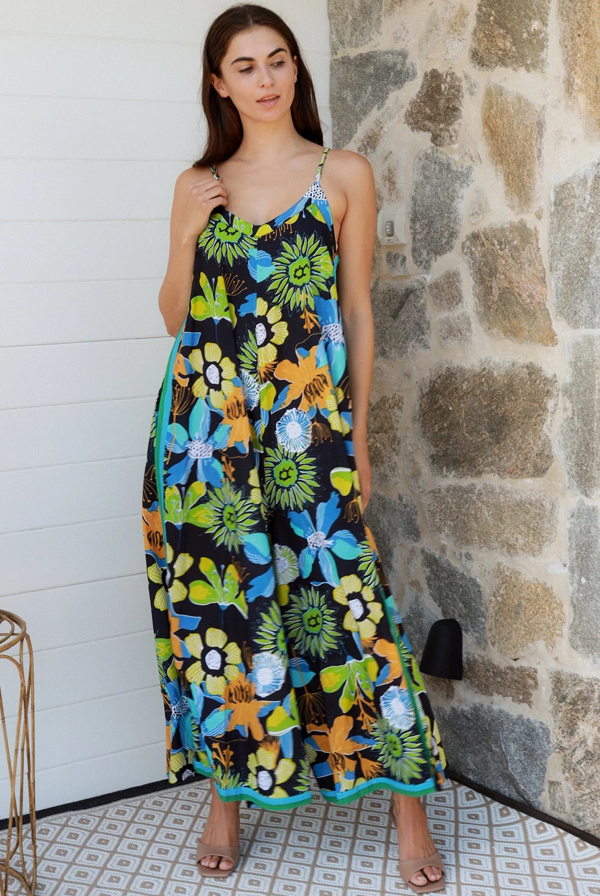 Woman in The Rio Jumpsuit — relaxed wide leg tropical boho jumpsuit with contrast side stripe | Bohemian Love Runway