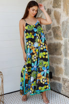 Woman in The Rio Jumpsuit — relaxed wide leg tropical boho jumpsuit with contrast side stripe | Bohemian Love Runway