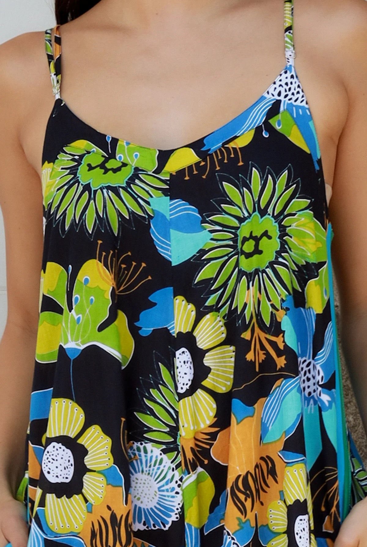 Woman in The Rio Jumpsuit — relaxed wide leg tropical boho jumpsuit with contrast side stripe | Bohemian Love Runway