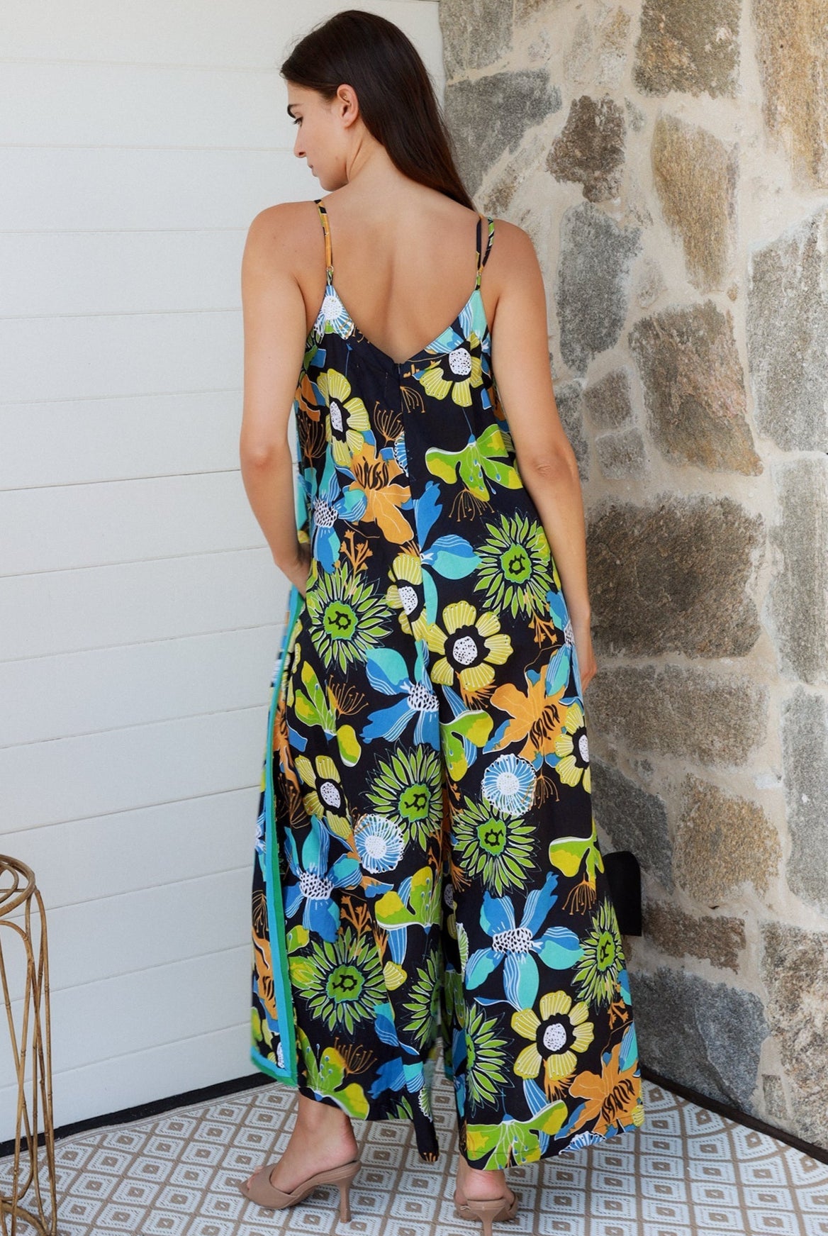 Woman in The Rio Jumpsuit — relaxed wide leg tropical boho jumpsuit with contrast side stripe | Bohemian Love Runway