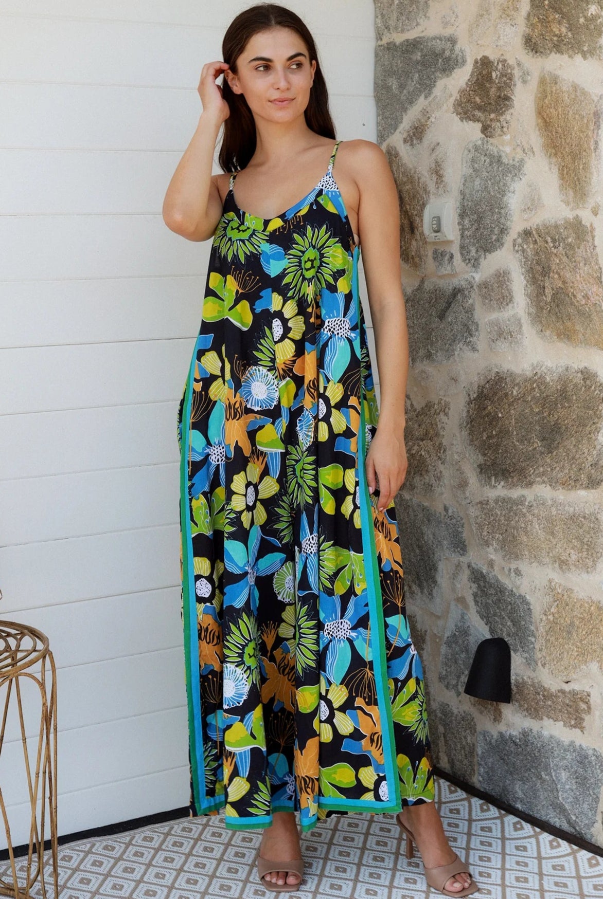 Woman in The Rio Jumpsuit — relaxed wide leg tropical boho jumpsuit with contrast side stripe | Bohemian Love Runway