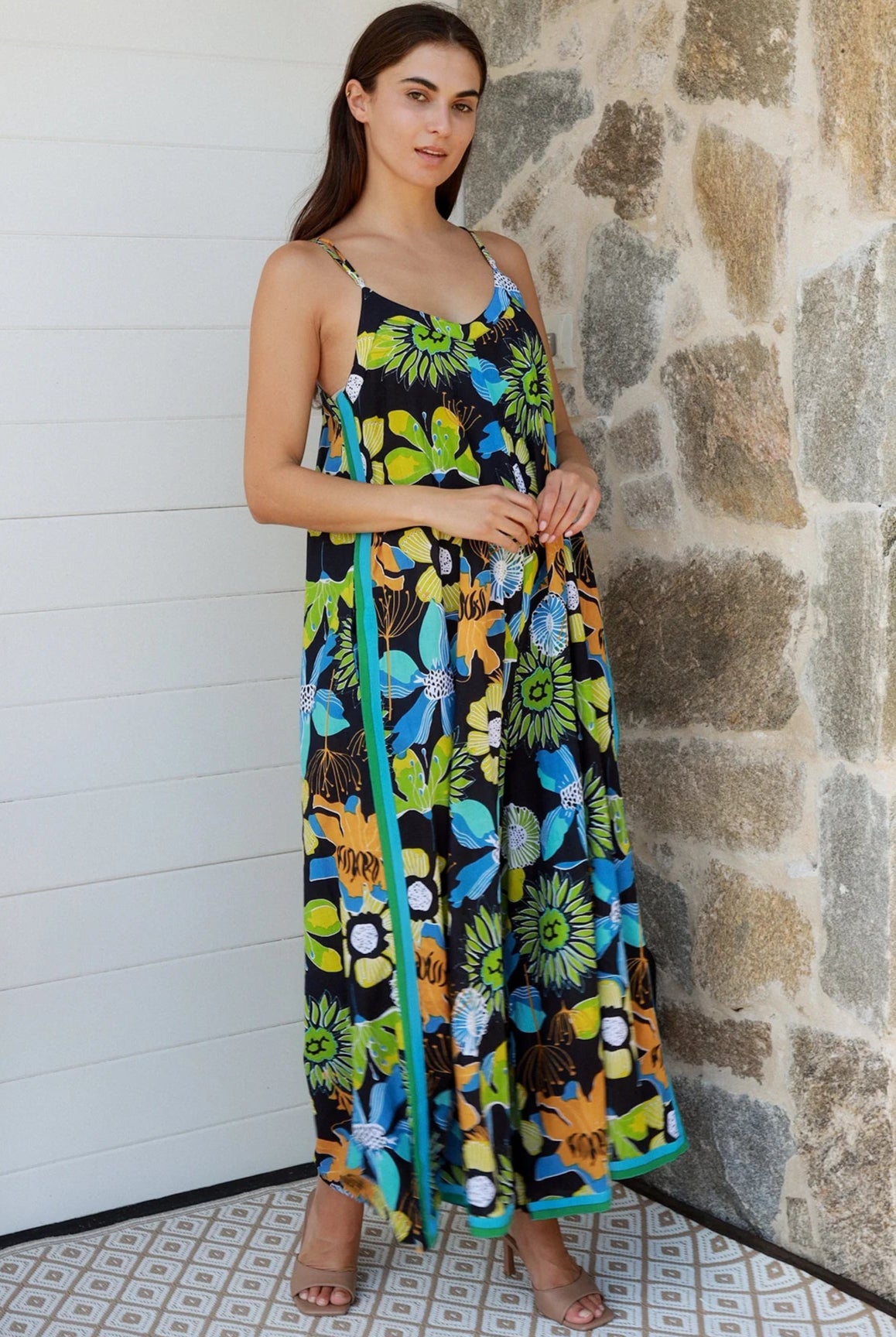 Woman in The Rio Jumpsuit — relaxed wide leg tropical boho jumpsuit with contrast side stripe | Bohemian Love Runway