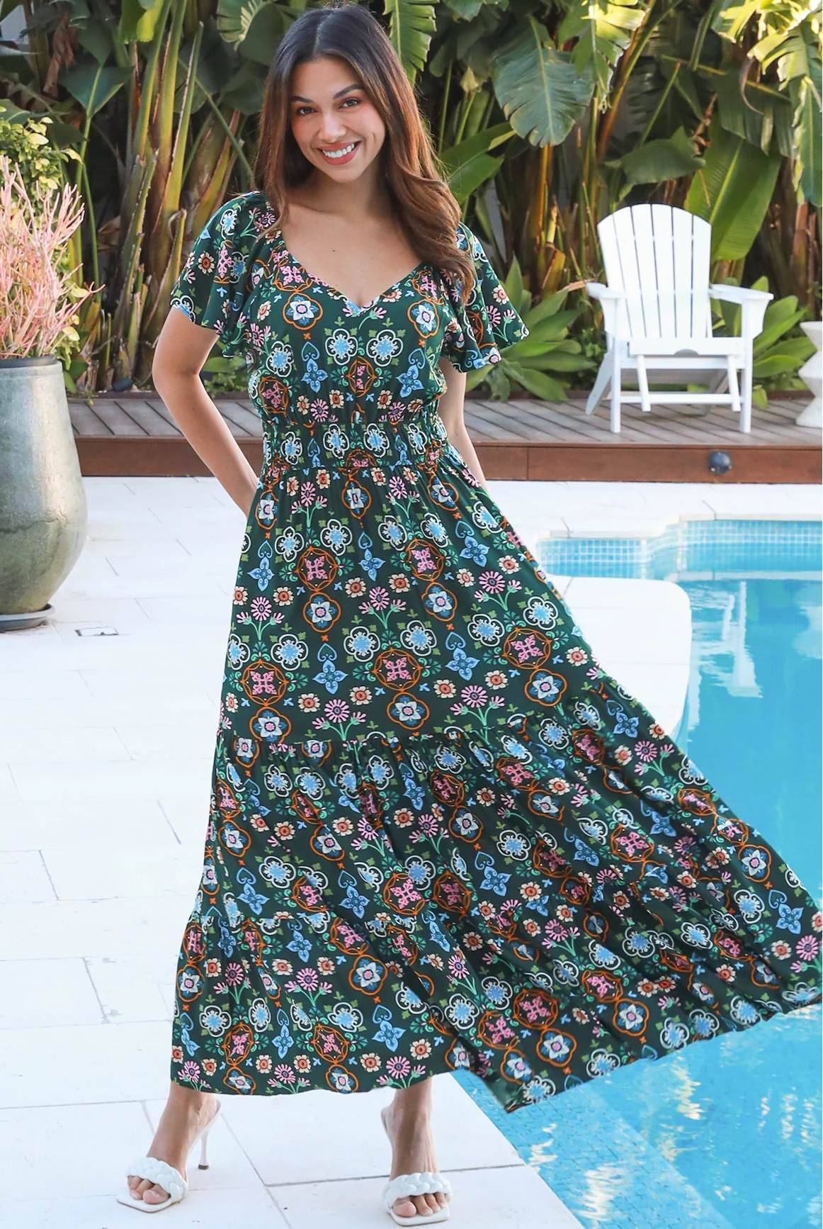Emily bohemian maxi dress in green rayon with flutter sleeves tiered skirt and shirred back