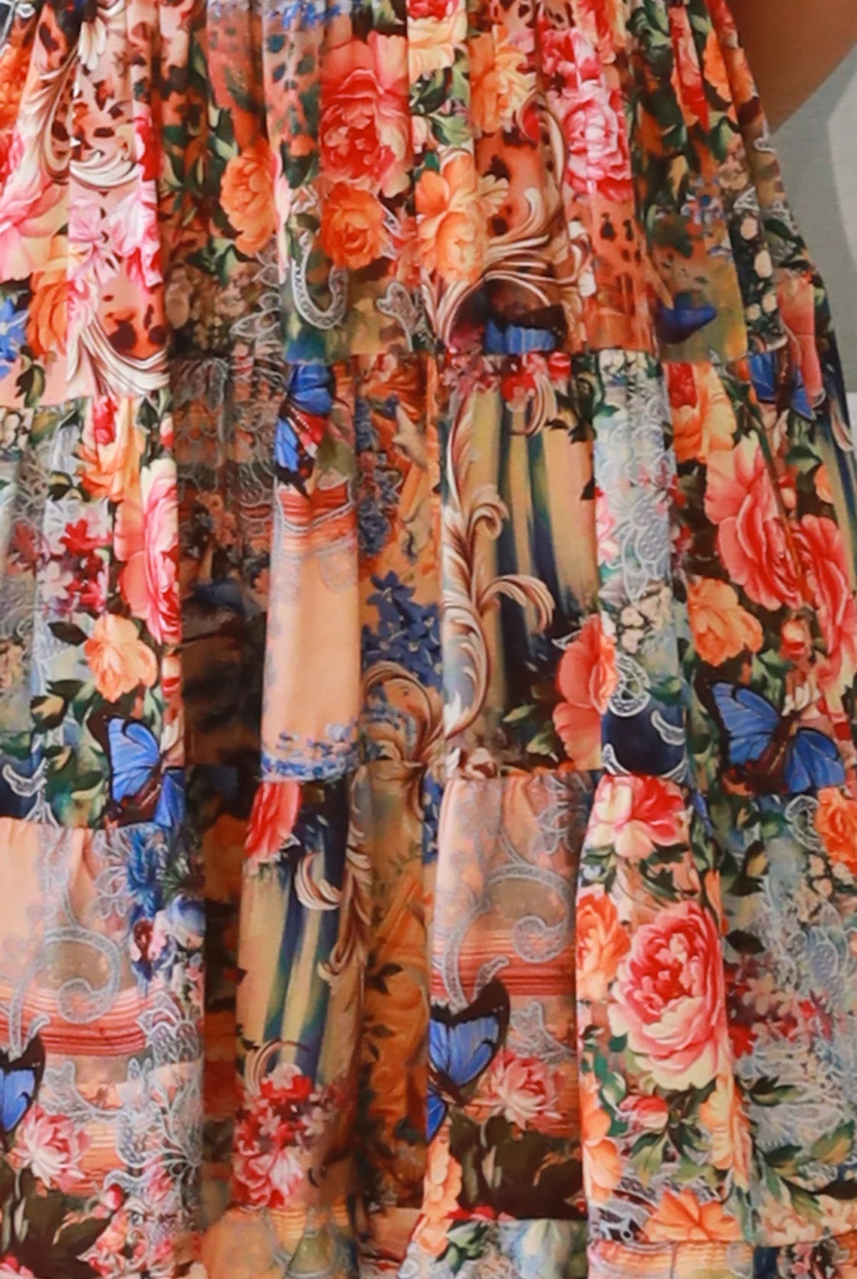 Boho mini dress in 100% rayon with floral butterfly print, shirred bodice and voluminous sleeves - designer bohemian style Australia.