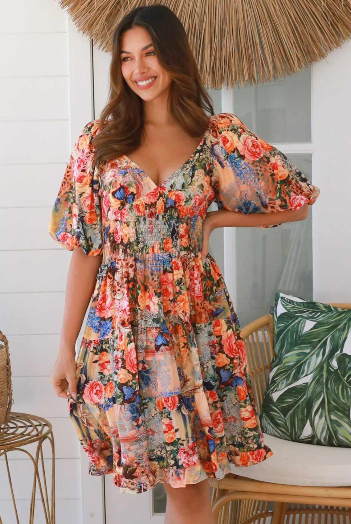 Boho mini dress in 100% rayon with floral butterfly print, shirred bodice and voluminous sleeves - designer bohemian style Australia.