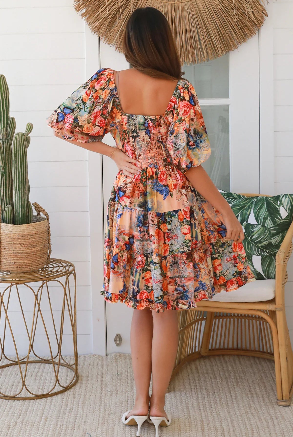 Boho mini dress in 100% rayon with floral butterfly print, shirred bodice and voluminous sleeves - designer bohemian style Australia.