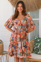 Boho mini dress in 100% rayon with floral butterfly print, shirred bodice and voluminous sleeves - designer bohemian style Australia.