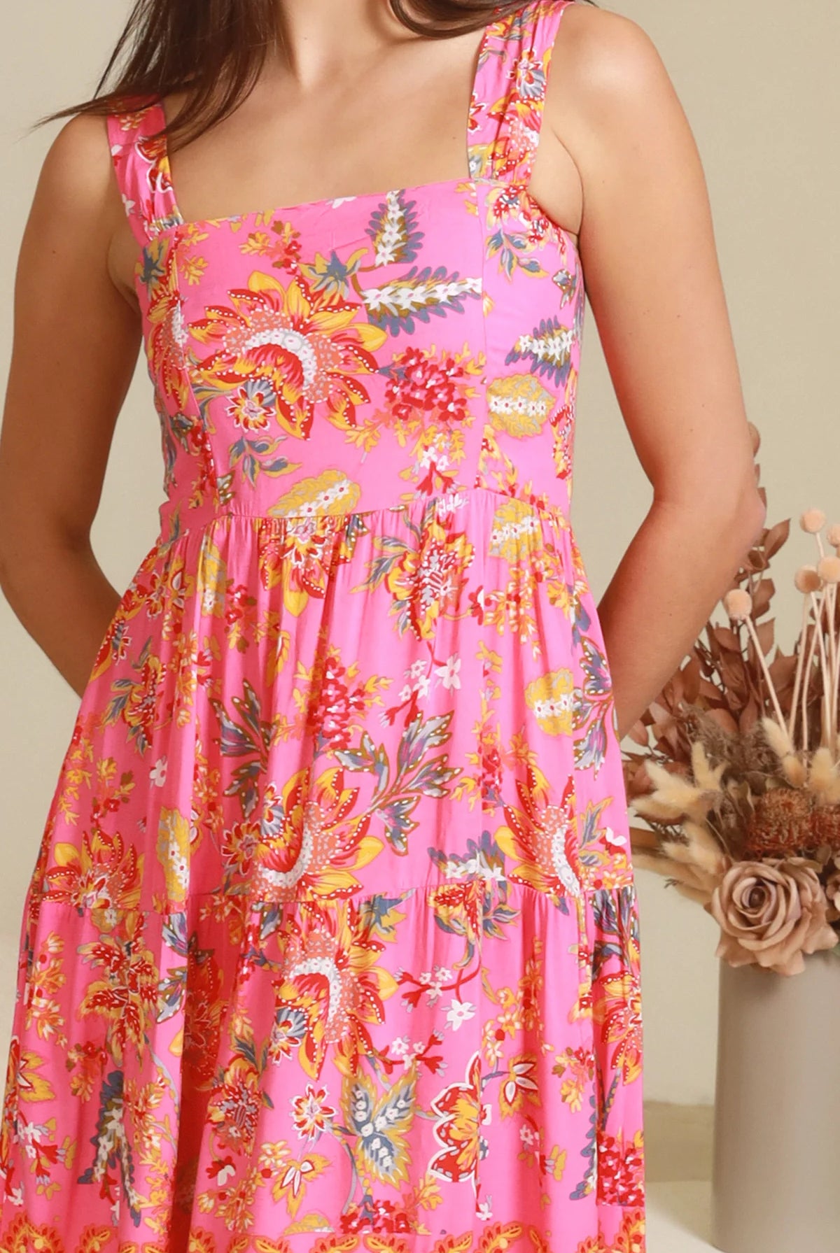 Imogen tiered floral maxi dress in pink bohemian print with fitted bodice, tie back straps and oversized tiered skirt Australia