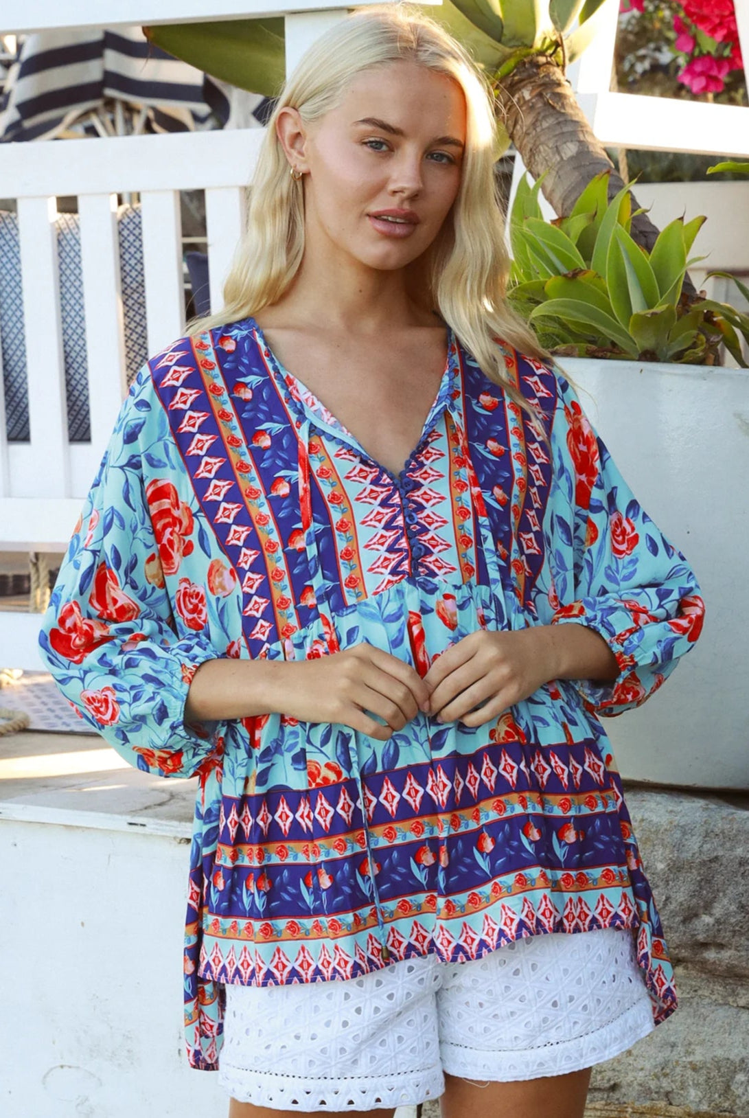 Boho woman wearing Clarice Rose Top with button front and elastic sleeves - Australian boho fashion - Bohemian Love Runway
