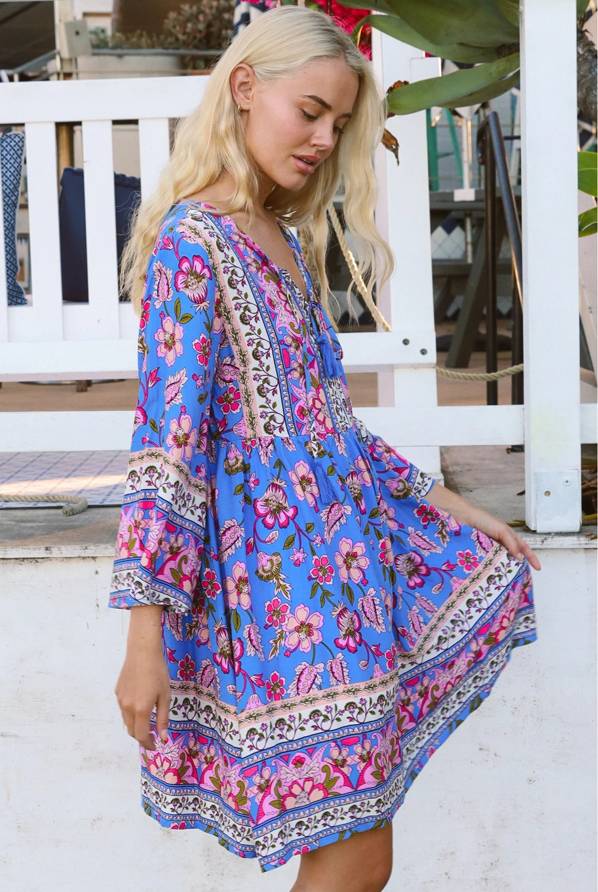 Bluebell riviera mini dress in seaside blue with picturesque florals tassel neckline and bell sleeves - boho mini dress Australia