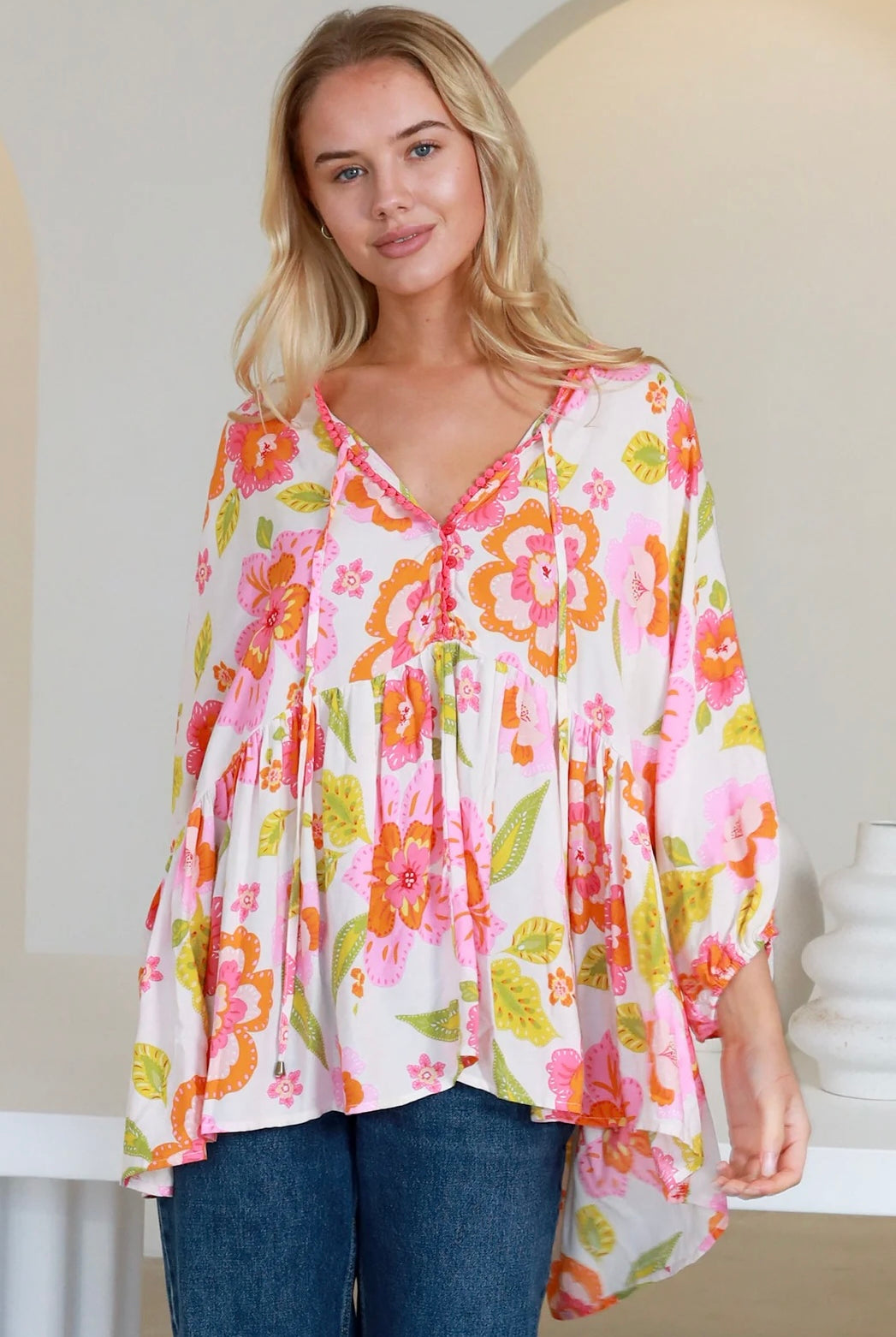 White floral rayon peplum boho blouse with v-neck beaded ties and soft elastic sleeve - The Isla Grace Top