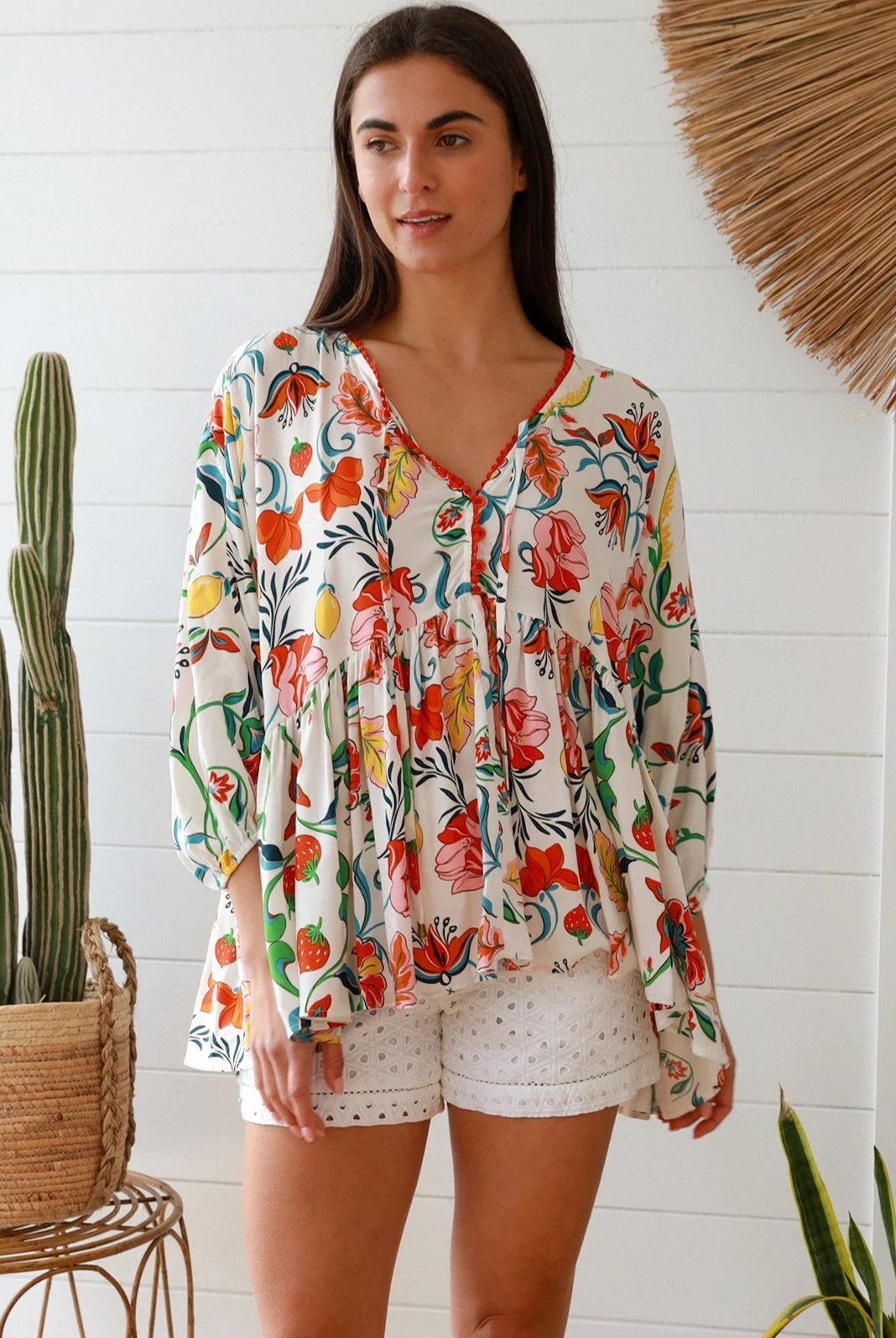 Boho floral print top with red and pink blossoms, relaxed fit, V-neckline with three-quarter sleeves - Australian bohemian fashion