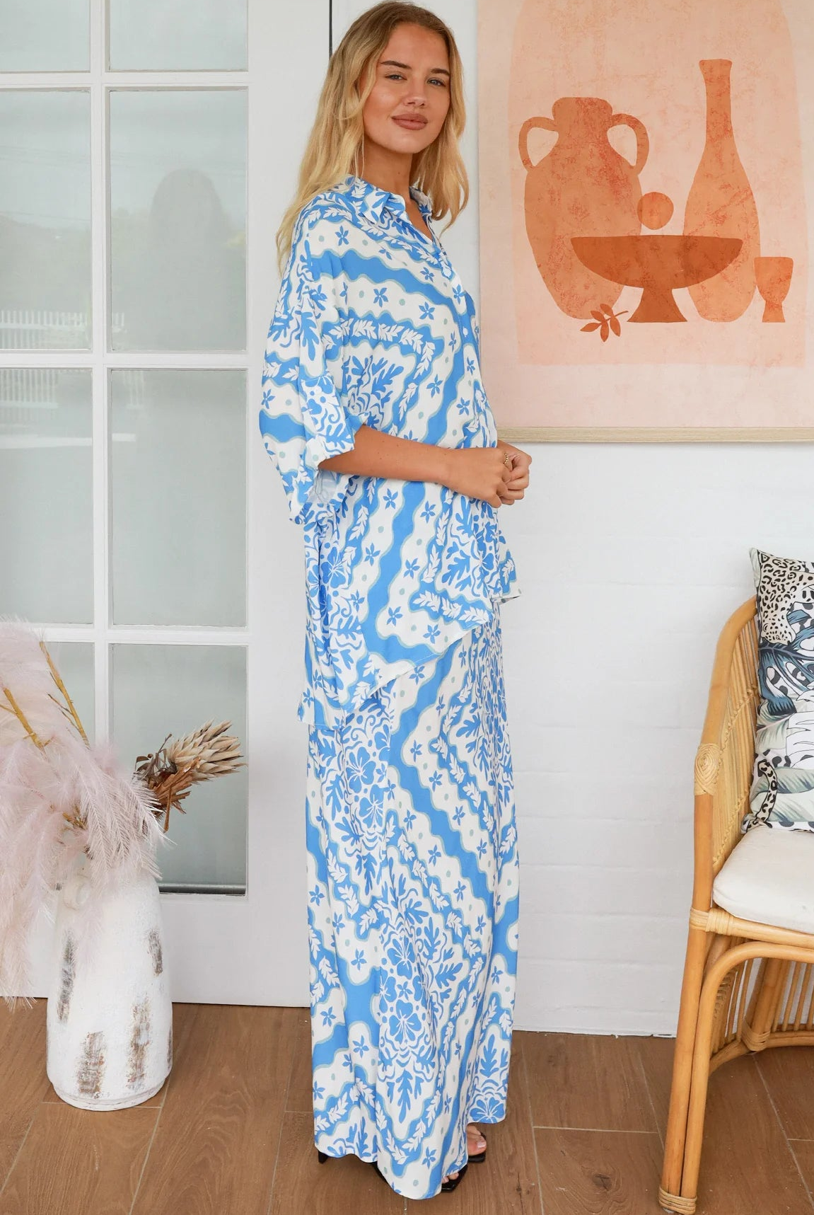 Dreamcatcher Emmy oversized blue floral rayon shirt with button front back yoke pleats and roll-tab sleeve detail