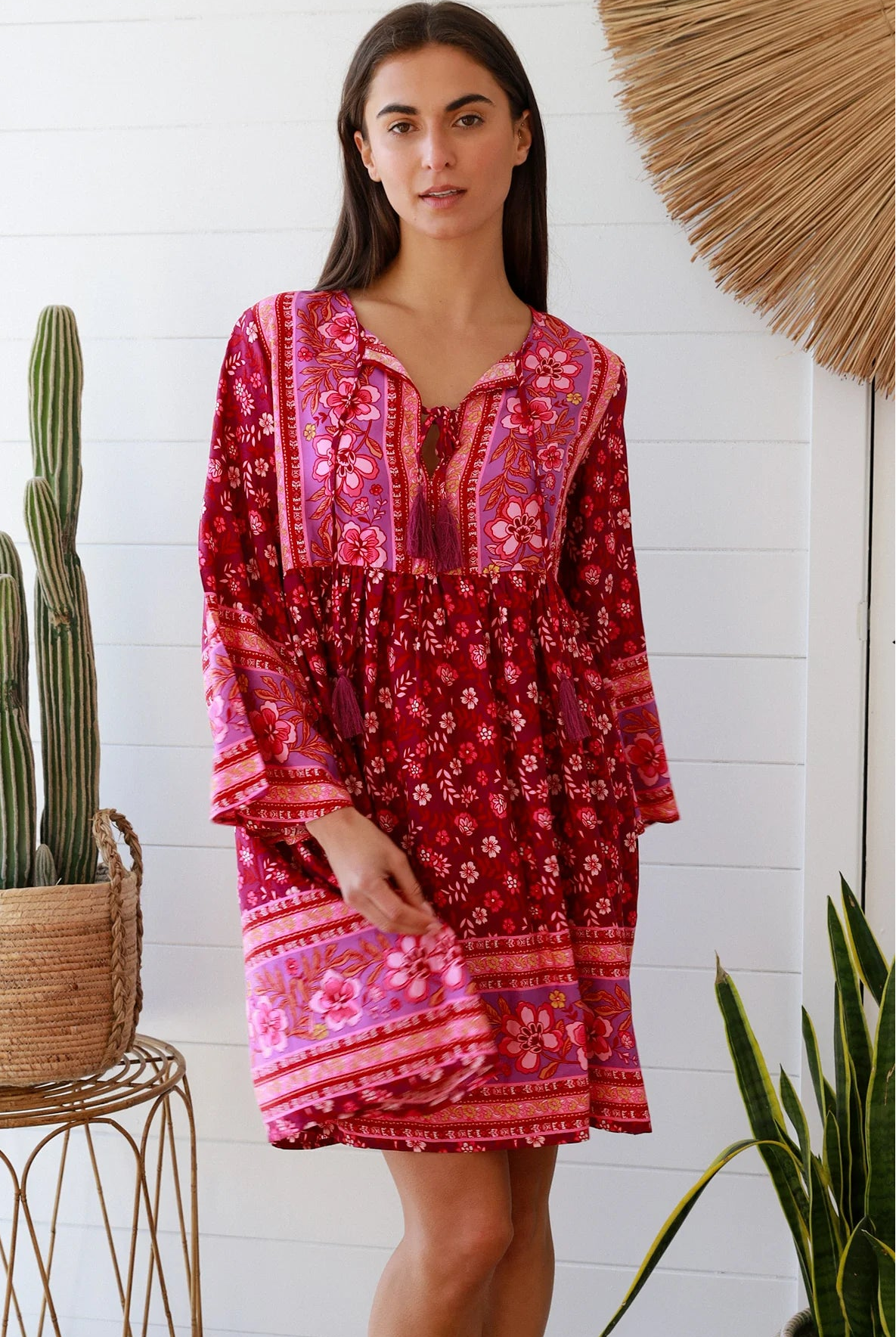 Raspberry floral bohemian mini dress with border print and flared sleeves Australian boho fashion