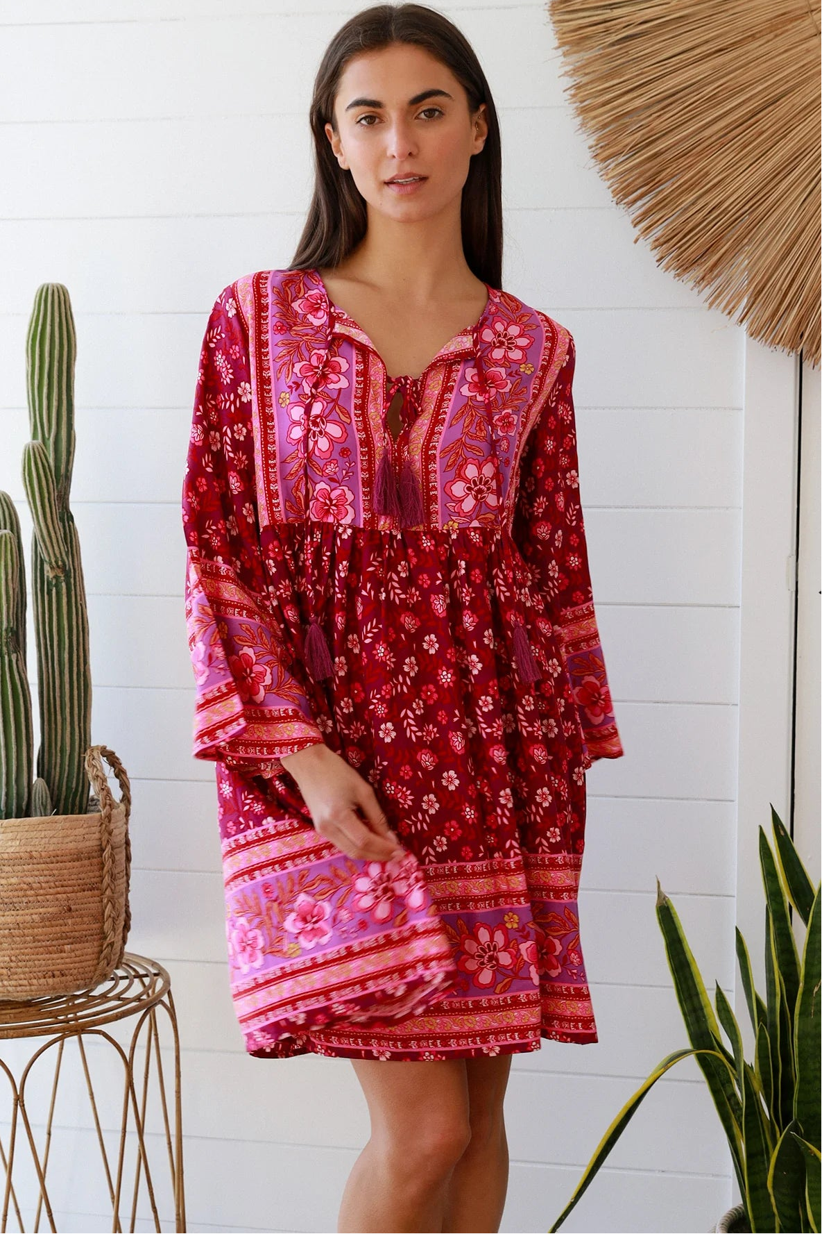 Raspberry floral bohemian mini dress with border print and flared sleeves Australian boho fashion