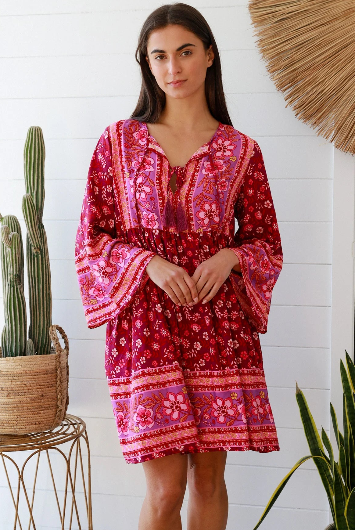 Raspberry floral bohemian mini dress with border print and flared sleeves Australian boho fashion