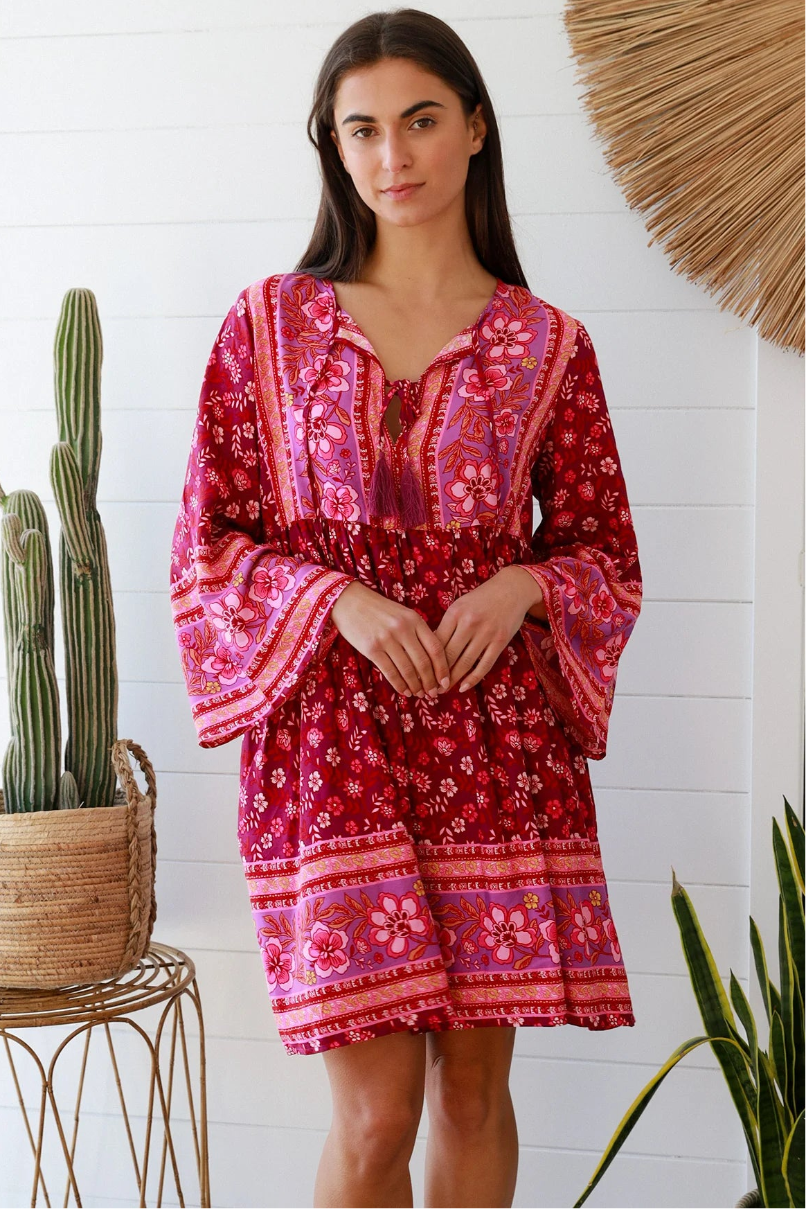 Raspberry floral bohemian mini dress with border print and flared sleeves Australian boho fashion
