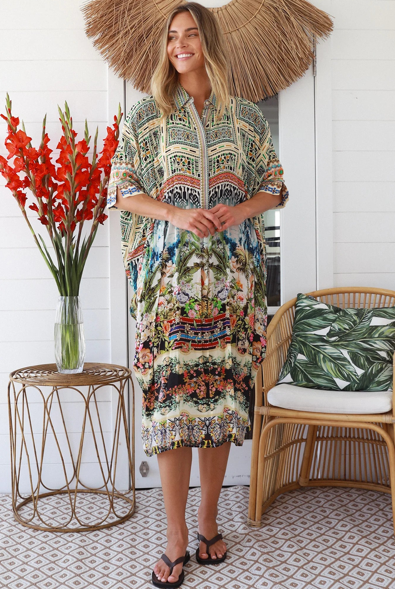 Woman wearing Oasis Kaftan Midi Dress in neutral geometric print with mosaic sleeve trim and petite collar – Peacock Feather Resort Collection