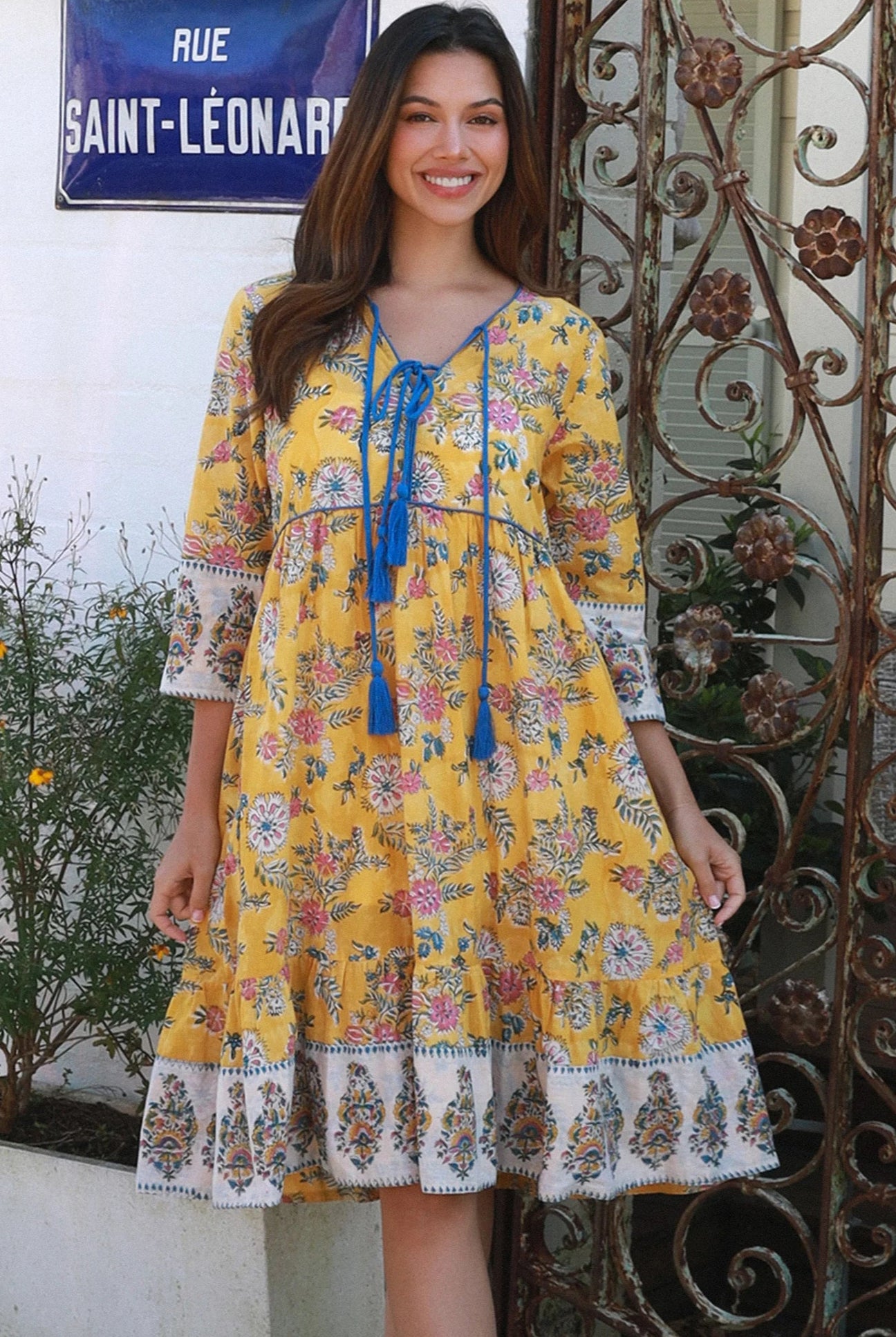 Golden Dahlia cotton boho mini dress wit floral border print blue piping and tassel ties - Australia