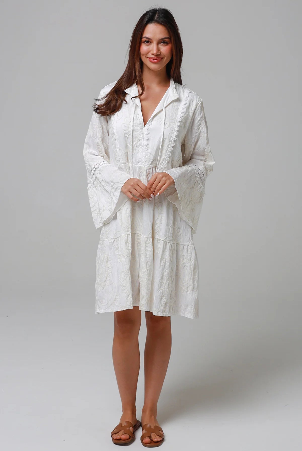 White embroidered cotton boho mini dress with lace sleeves and tassel ties - Bohemian Love Runway Australia Boho.