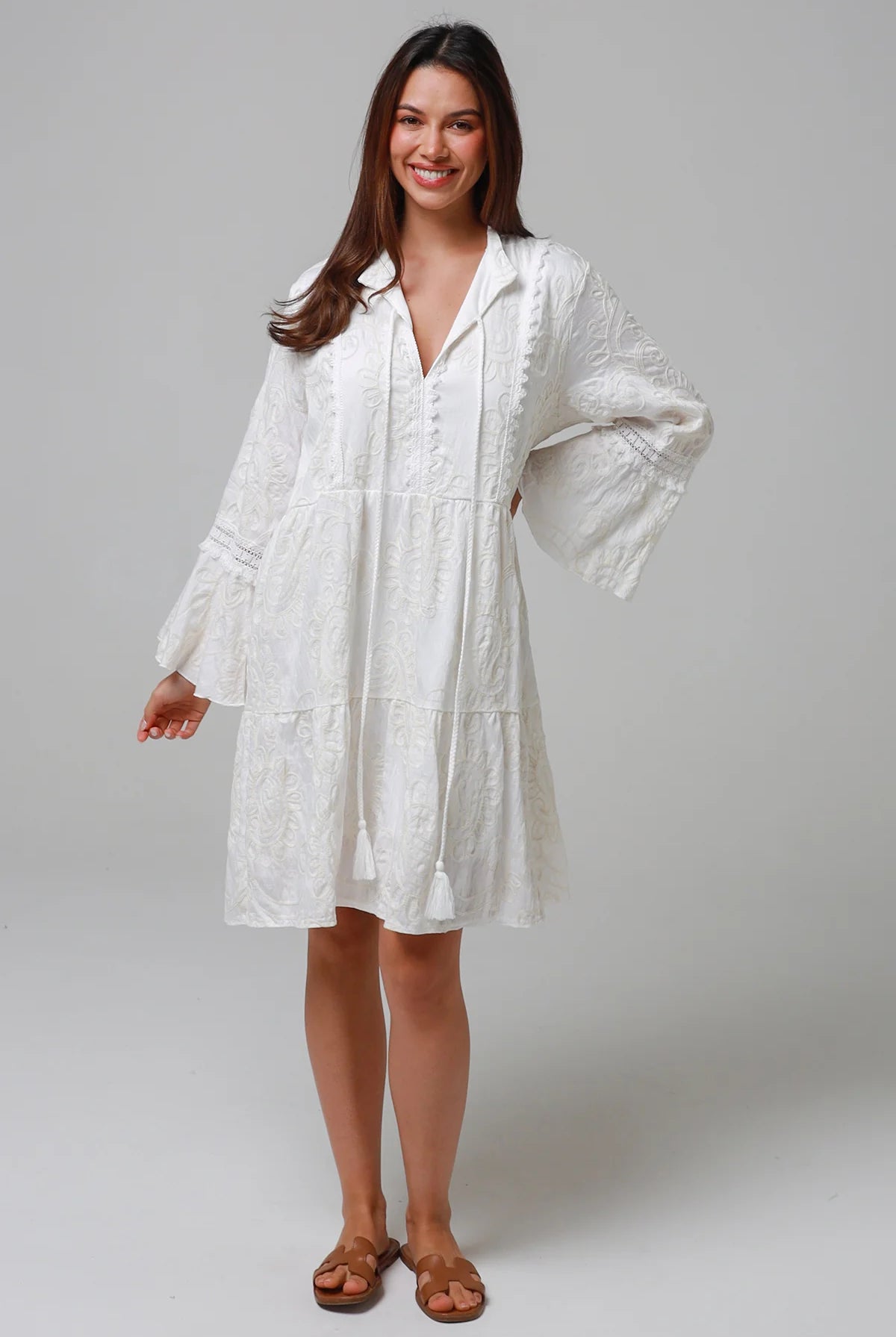 White embroidered cotton boho mini dress with lace sleeves and tassel ties - Bohemian Love Runway Australia Boho.