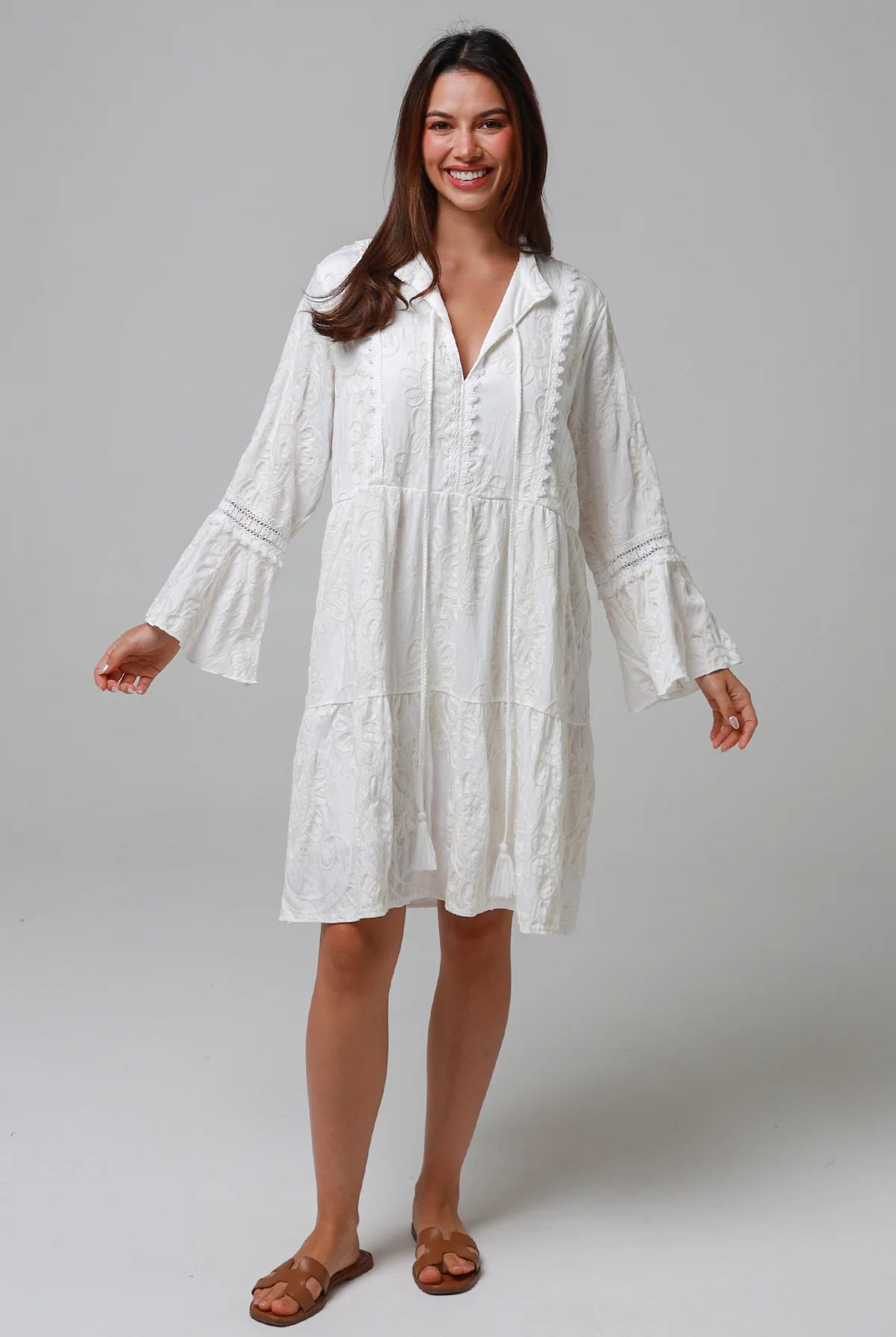 White embroidered cotton boho mini dress with lace sleeves and tassel ties - Bohemian Love Runway Australia Boho.