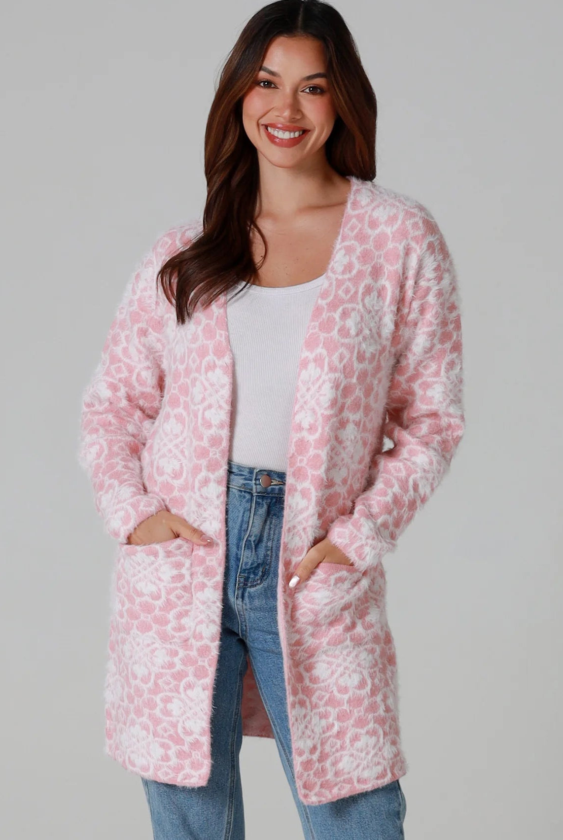 Luxury pink floral longline cardigan brushed knit with front patch pockets Charlotte the Label soft halo texture. Boho Knitwear Australia.