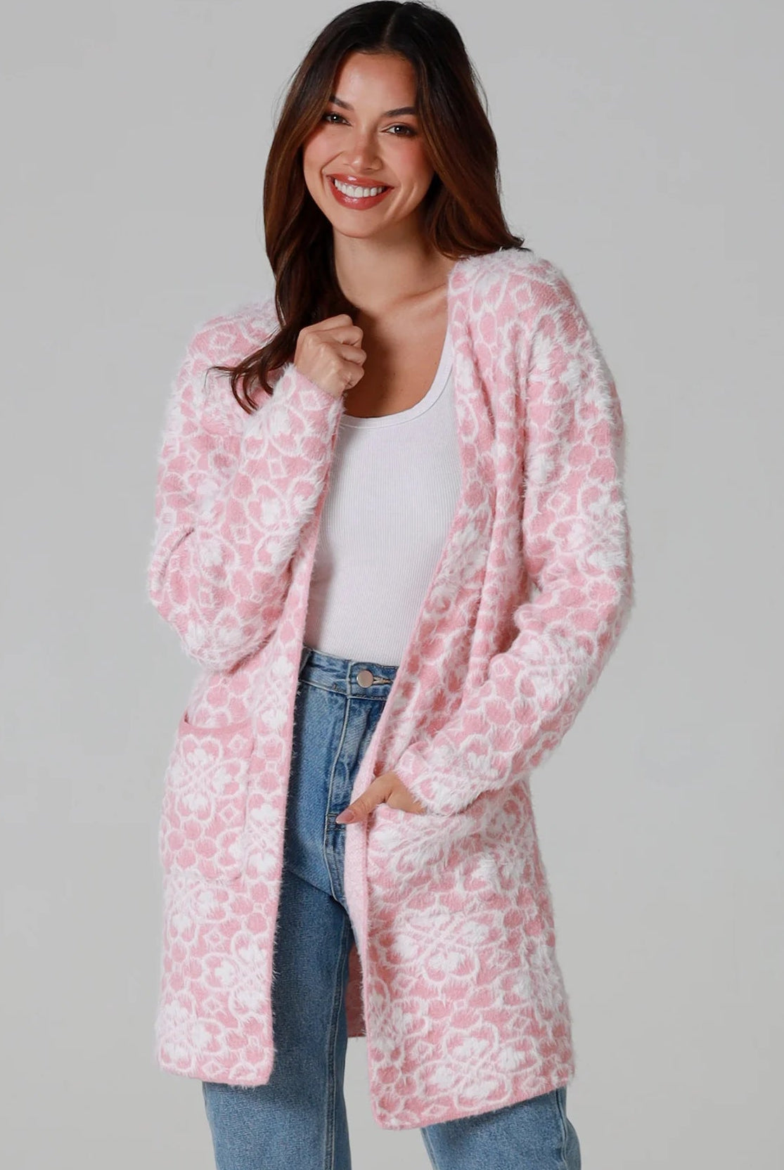 Luxury pink floral longline cardigan brushed knit with front patch pockets Charlotte the Label soft halo texture. Boho Knitwear Australia.
