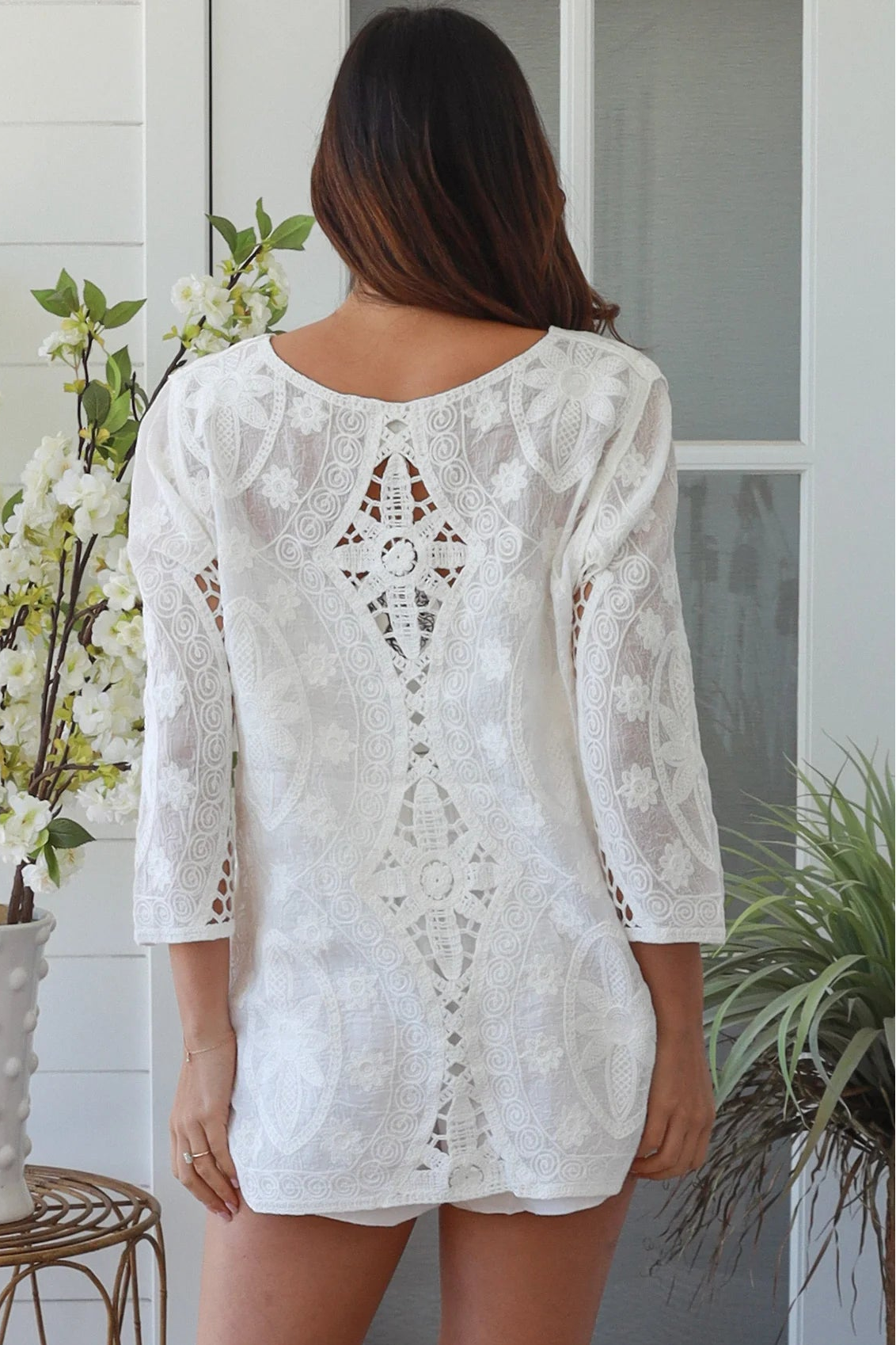 White embroidered cotton boho top with crochet detailing and three quarter sleeves relaxed Australian bohemian style
