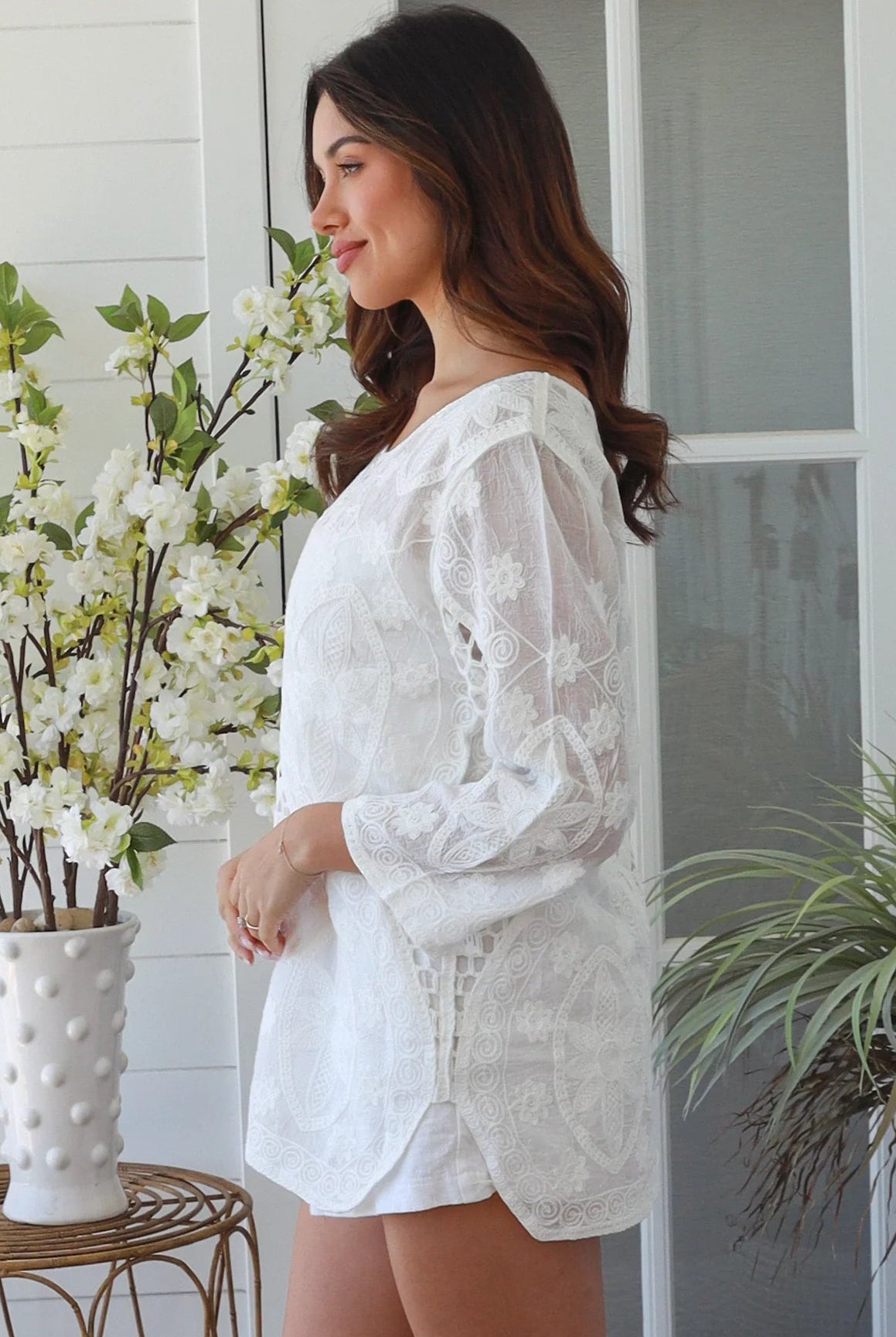 White embroidered cotton boho top with crochet detailing and three quarter sleeves relaxed Australian bohemian style