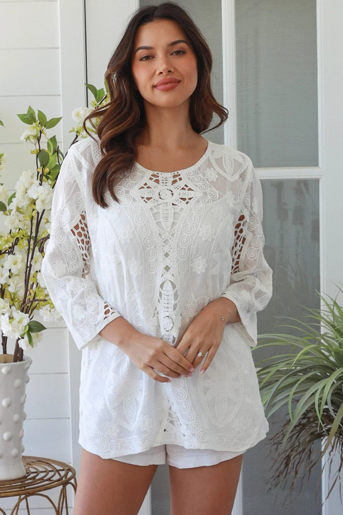 White embroidered cotton boho top with crochet detailing and three quarter sleeves relaxed Australian bohemian style