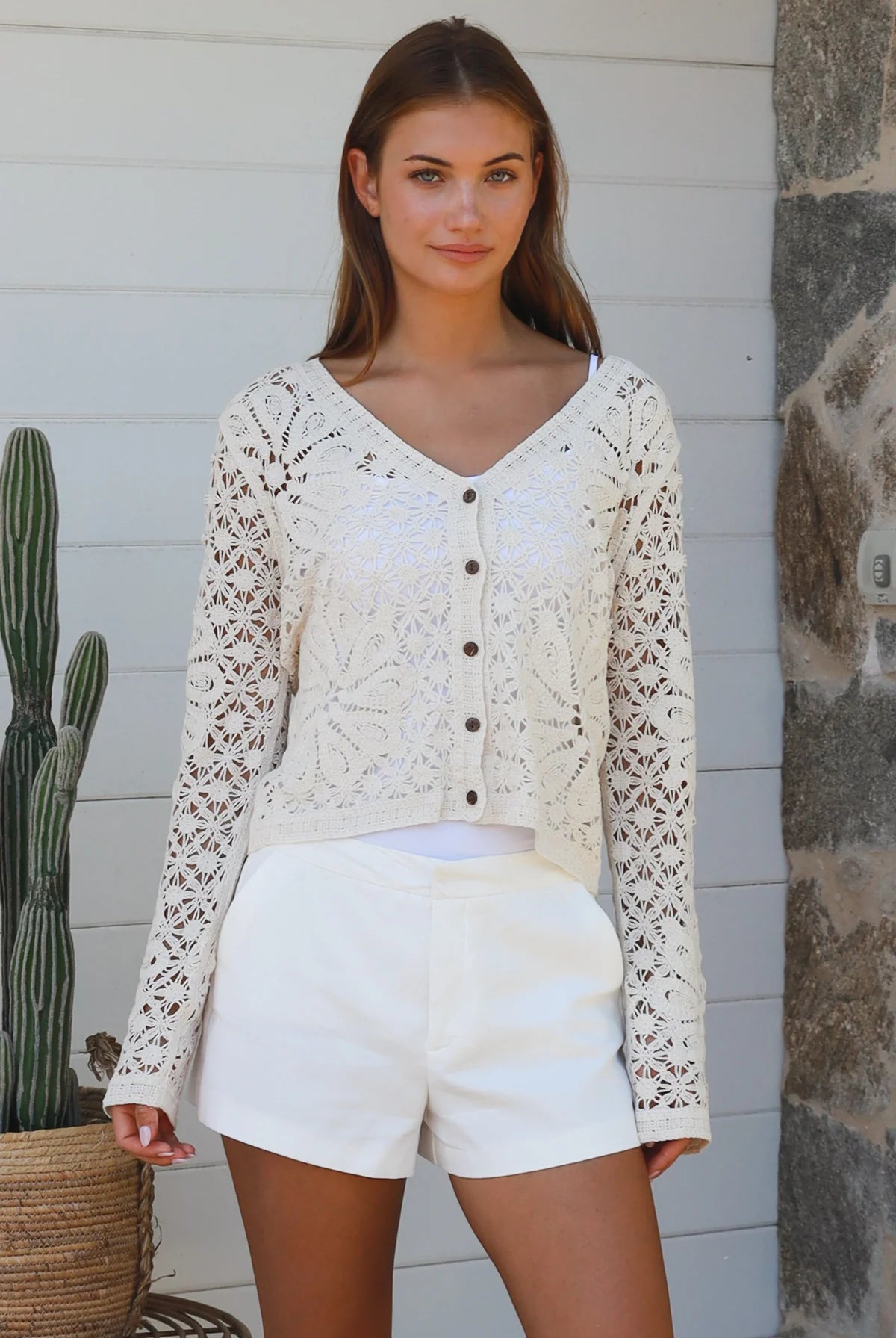 Cream floral crochet cardigan with scalloped sleeves and button-front V-neck styling — boho knitwear Australia