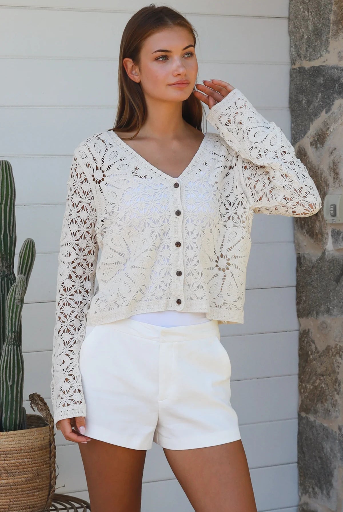 Cream floral crochet cardigan with scalloped sleeves and button-front V-neck styling — boho knitwear Australia